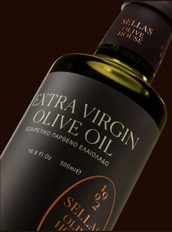 Premium Greek extra virgin olive oil being poured